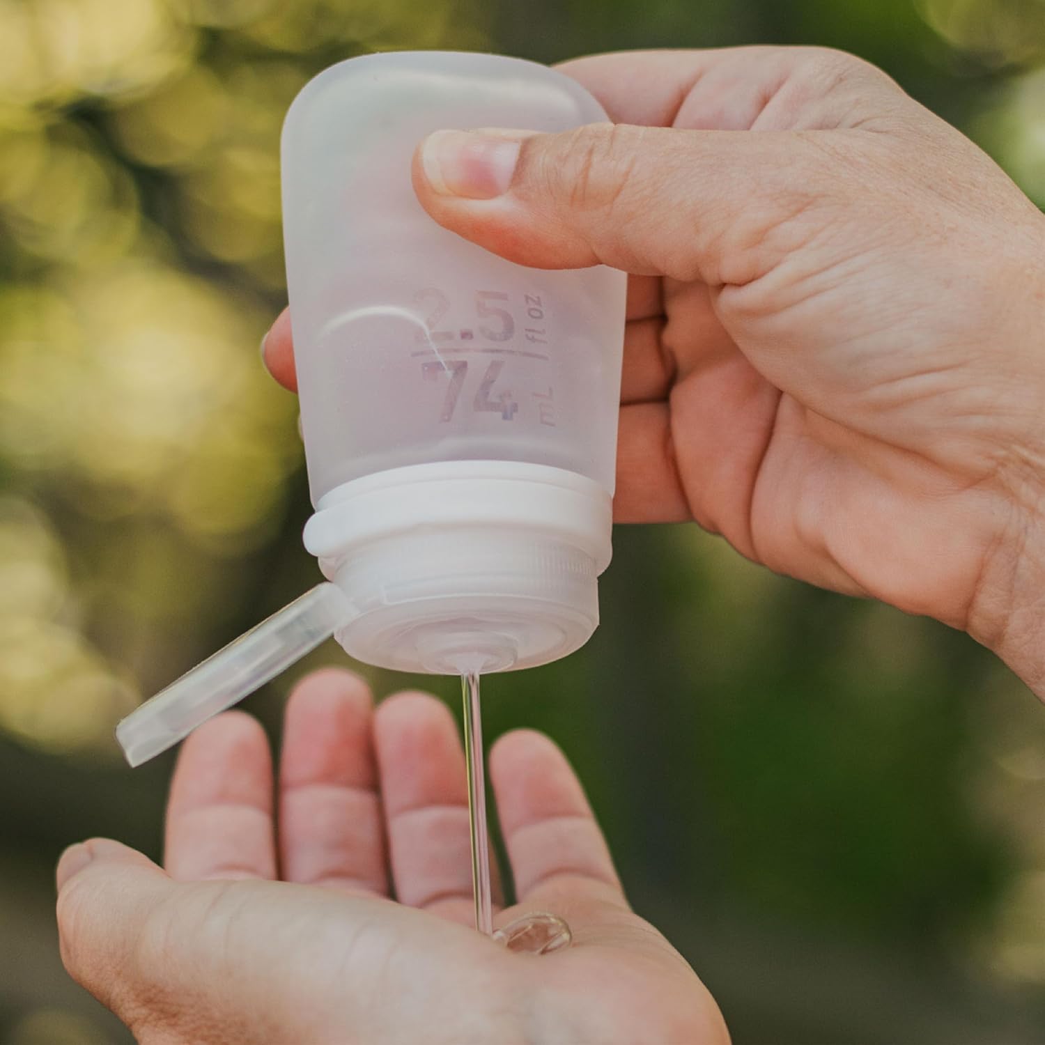 humangear GoToob+ 3-Pack (Small) | Refillable Silicone Travel Bottle | Locking Lid | Food-Safe Material. Clear/Green/Blue. Small (1.7 fl.oz; 53ml)